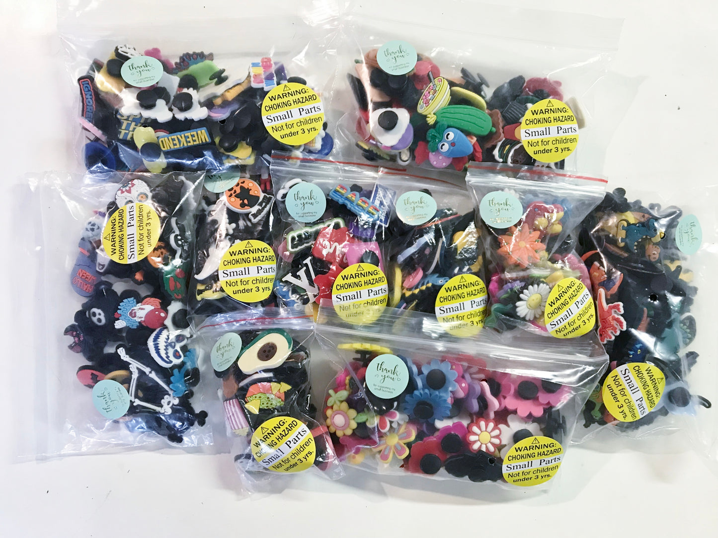 Wholesale package deals themed random charms, unbranded shoe charms, flowers, halloween, food, dinosaurs, your choice